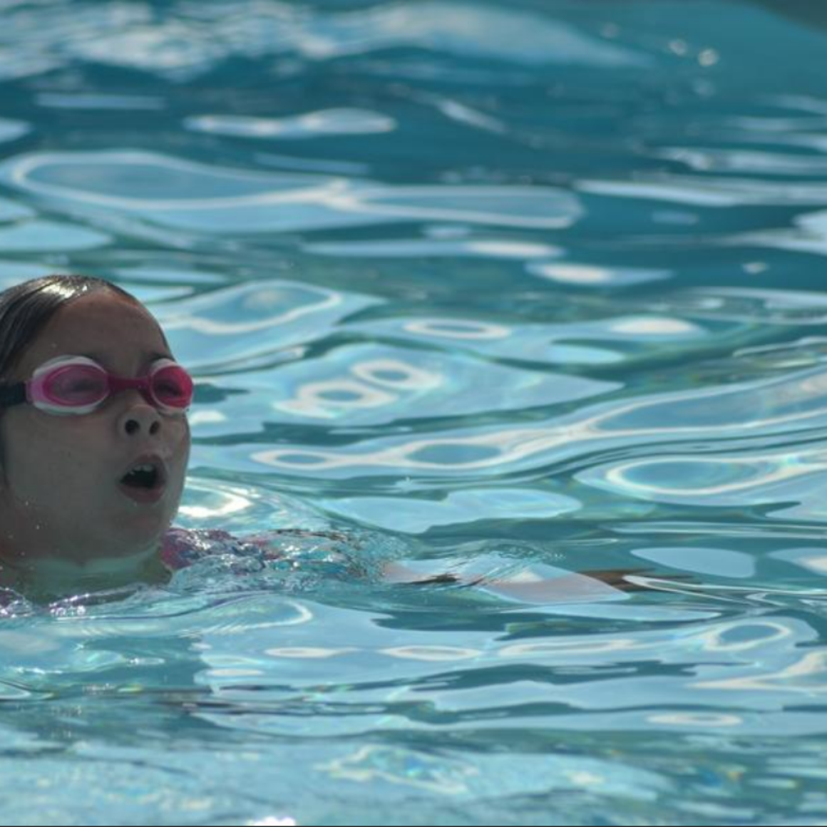  Emma Feng completing laps at Swimathon Community Swim. [Courtesy Photo/Kara Driscoll] 